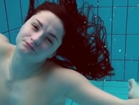 Tattooed babe liza bubarek showing her naked ass underwater