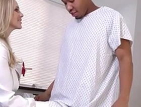 Julia Ann, voluptuous cougar, encounters a large black penis during a medical procedure