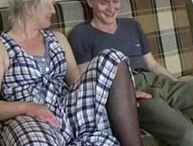 Lena, the mature woman, and a younger man engage in sexual activity
