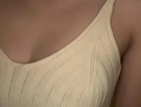 A sensual massage leads to a satisfying creampie. She expresses her pleasure with a smile.