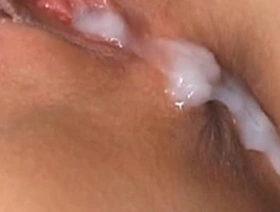 Sakurakos shaved pussy filled with jizz