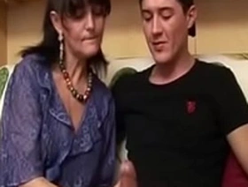 Mature slut sucks huge young cock