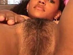 Beautiful black teen grace loves playing with her natural and hairy pussy