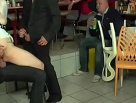 Mistress in leather dominates slave in public